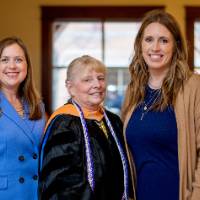 Faculty and family takes picture